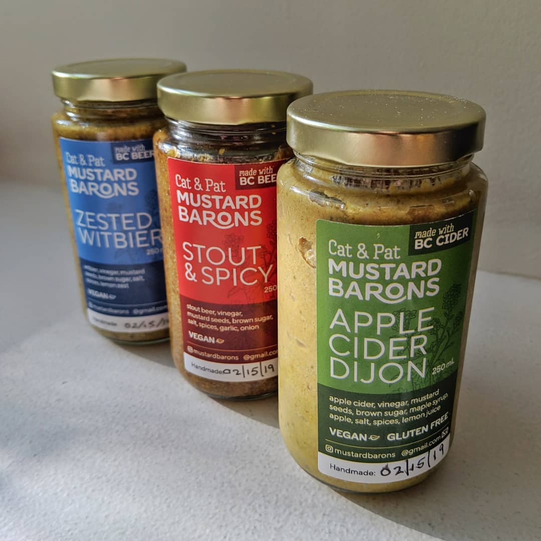 Three Mustard Barons jars with printed labels